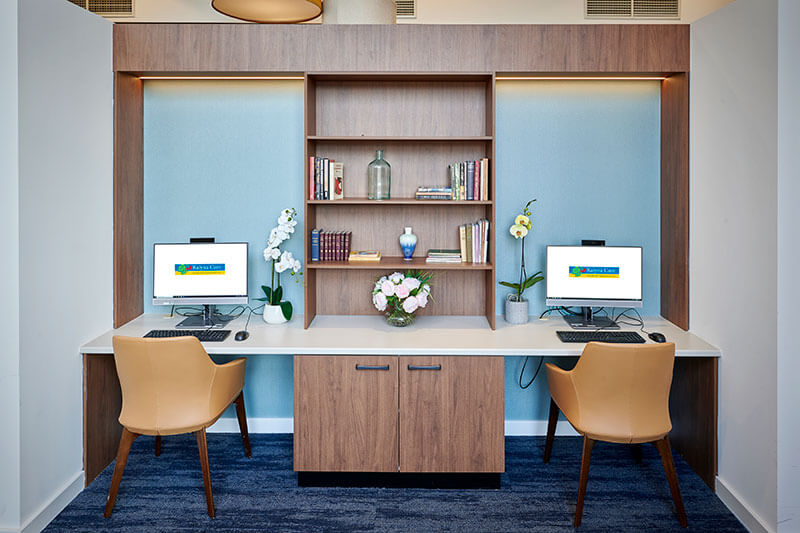 Desk with computers at Kalyna Care