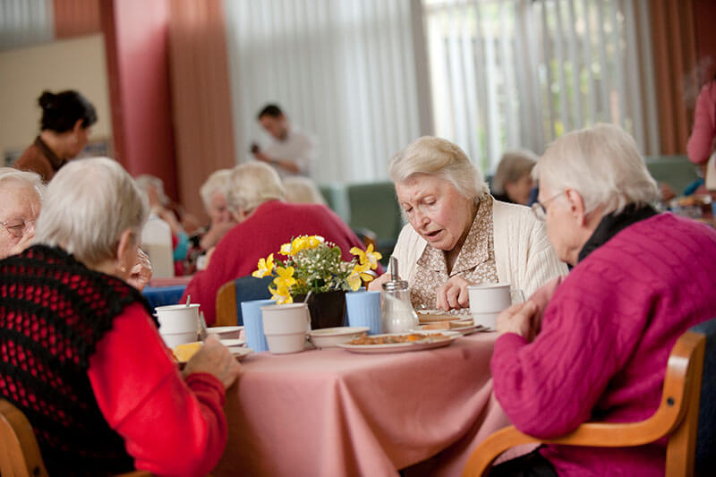 Eating dinner in the dining room at Kalyna Care